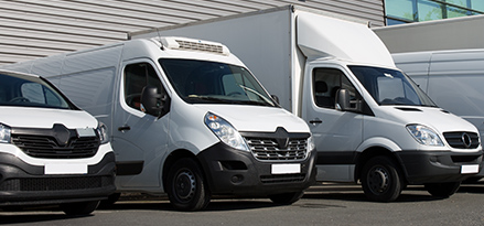 white vans parked