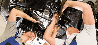 mechanics under car